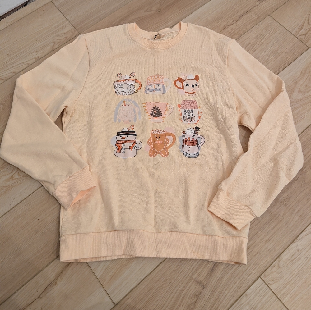 Light Yellow Graphic Christmas Sweatshirt With Christmas Mug Details